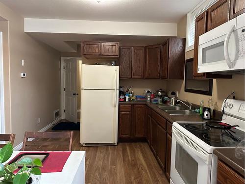 407 6 Street North, Marwayne, AB - Indoor Photo Showing Kitchen With Double Sink