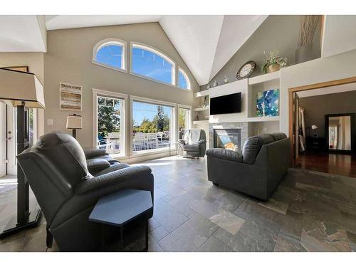 88 Whitetail Avenue, Rural Vermilion River, County Of, AB - Indoor Photo Showing Living Room With Fireplace