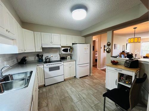 301-5101 51 Street, Vermilion, AB - Indoor Photo Showing Kitchen With Double Sink