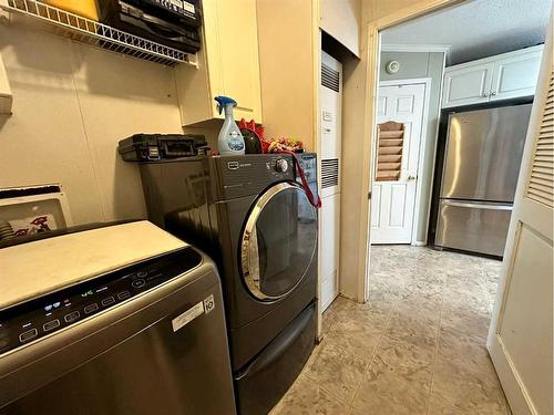 4931 52 Street, Consort, AB - Indoor Photo Showing Laundry Room