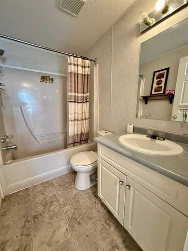 4931 52 Street, Consort, AB - Indoor Photo Showing Bathroom