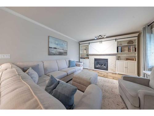 Ne-32-49-25-W3, Rural, SK - Indoor Photo Showing Living Room With Fireplace