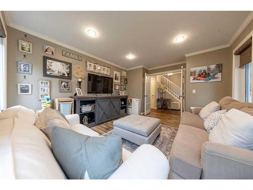 Ne-32-49-25-W3, Rural, SK - Indoor Photo Showing Living Room With Fireplace