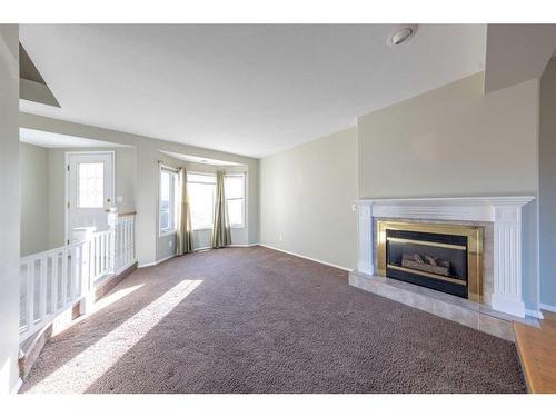 3906 59 Avenue Close, Lloydminster, AB - Indoor Photo Showing Living Room With Fireplace