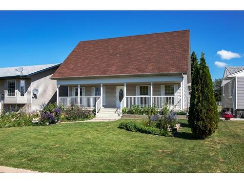 1038 16 Avenue, Wainwright, AB - Outdoor With Deck Patio Veranda With Facade