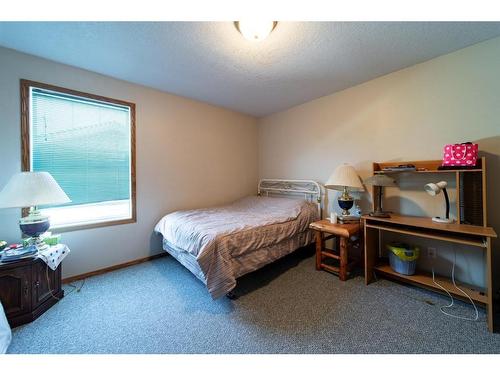 1038 16 Avenue, Wainwright, AB - Indoor Photo Showing Bedroom