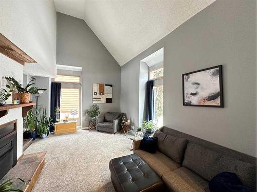 5808 51 Avenue, Vermilion, AB - Indoor Photo Showing Living Room With Fireplace