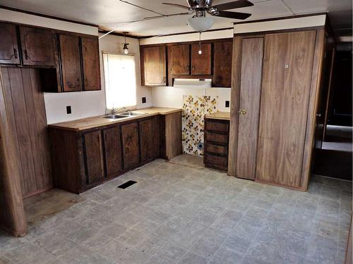 5050 43A Street, Vermilion, AB - Indoor Photo Showing Kitchen With Double Sink