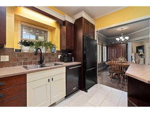 6005 23 Street, Lloydminster, AB - Indoor Photo Showing Kitchen With Double Sink