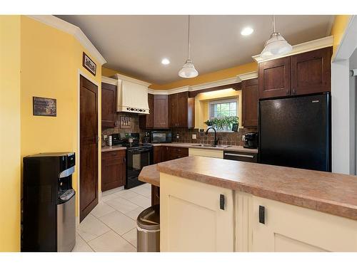 6005 23 Street, Lloydminster, AB - Indoor Photo Showing Kitchen With Double Sink