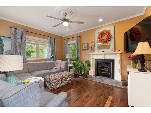 6005 23 Street, Lloydminster, AB - Indoor Photo Showing Living Room With Fireplace