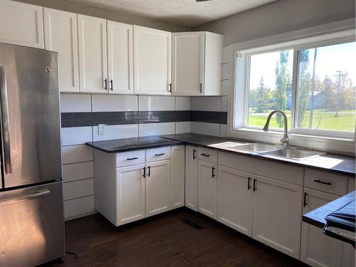 209 Main Street, Waseca, SK - Indoor Photo Showing Kitchen With Double Sink