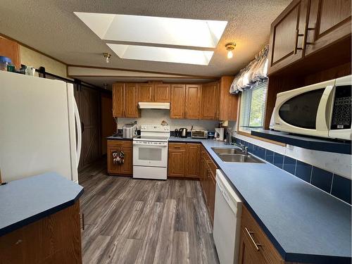 4823 52 Avenue, Irma, AB - Indoor Photo Showing Kitchen With Double Sink