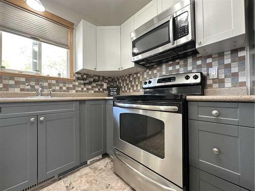 5116 49 Street, Provost, AB - Indoor Photo Showing Kitchen With Stainless Steel Kitchen With Double Sink