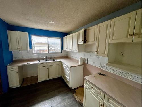 5827 51 Avenue, Vermilion, AB - Indoor Photo Showing Kitchen With Double Sink