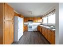 5610 47 Street, Lloydminster, AB  - Indoor Photo Showing Kitchen With Double Sink 