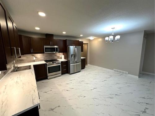 4821 48 Street, Hardisty, AB - Indoor Photo Showing Kitchen With Stainless Steel Kitchen