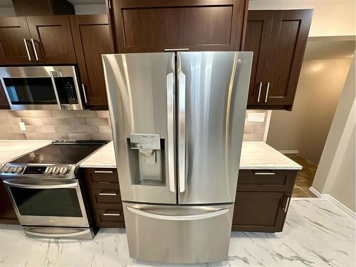 4821 48 Street, Hardisty, AB - Indoor Photo Showing Kitchen With Stainless Steel Kitchen