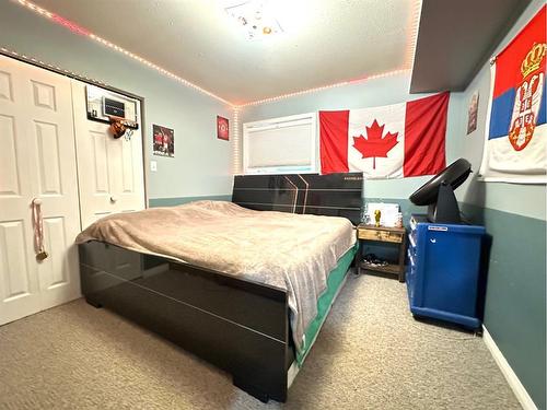 206 4 Avenue North, Marwayne, AB - Indoor Photo Showing Bedroom