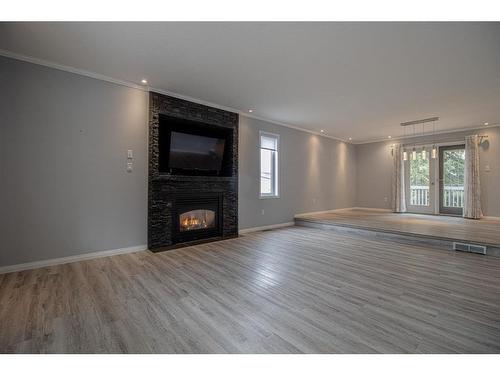 442009 Rge Rd 65, Rural Wainwright No. 61, M.D. Of, AB - Indoor Photo Showing Living Room With Fireplace