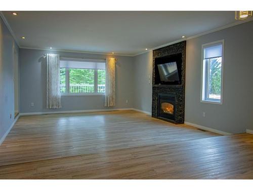 442009 Rge Rd 65, Rural Wainwright No. 61, M.D. Of, AB - Indoor Photo Showing Living Room With Fireplace