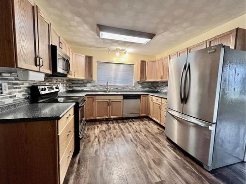 1108 24 Street, Wainwright, AB - Indoor Photo Showing Kitchen With Stainless Steel Kitchen With Double Sink