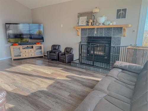 444064 Rge Rd 50, Rural Wainwright No. 61, M.D. Of, AB - Indoor Photo Showing Living Room With Fireplace