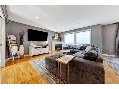 5204 24 Street, Lloydminster, AB - Indoor Photo Showing Living Room With Fireplace