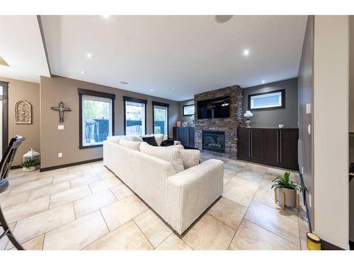 1604 52B Avenue Close, Lloydminster, AB - Indoor Photo Showing Living Room With Fireplace