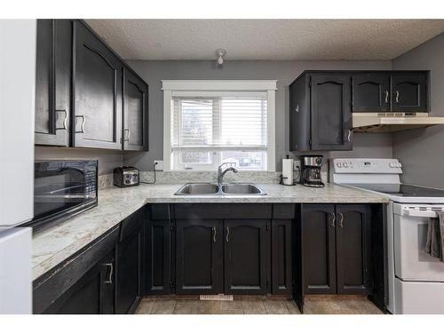 2909 56 Avenue, Lloydminster, AB - Indoor Photo Showing Kitchen With Double Sink