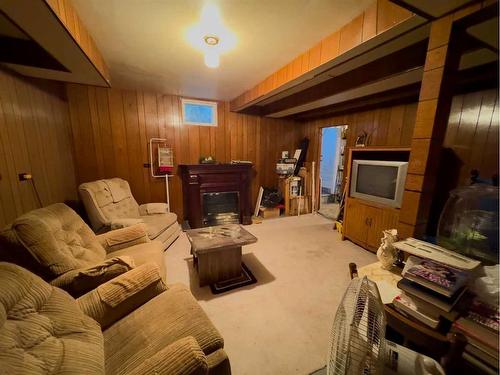 5106 4 Avenue, Chauvin, AB - Indoor With Fireplace