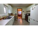 5106 4 Avenue, Chauvin, AB  - Indoor Photo Showing Kitchen With Double Sink 