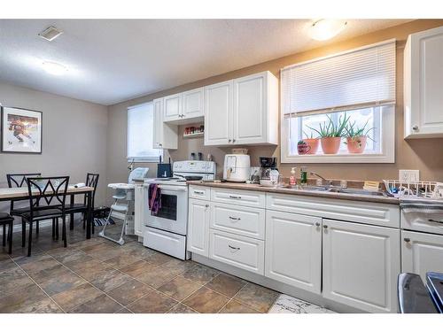 5123 50 Street, Lloydminster, AB - Indoor Photo Showing Kitchen With Double Sink