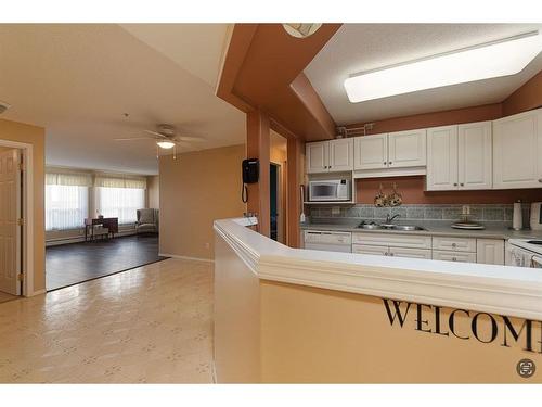 106-51116 49 Avenue, Lloydminster, AB - Indoor Photo Showing Kitchen With Double Sink