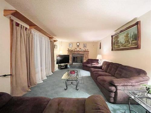 5123 55 Avenue, Edgerton, AB - Indoor Photo Showing Living Room With Fireplace