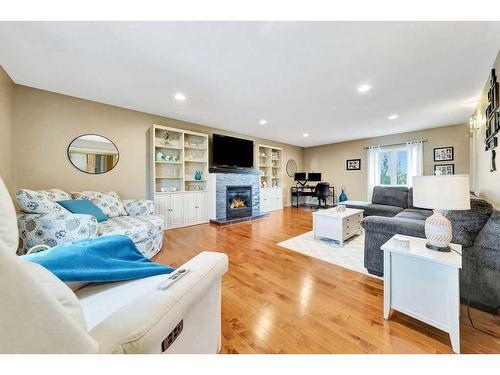 1620 53A Avenue Close, Lloydminster, AB - Indoor Photo Showing Living Room With Fireplace