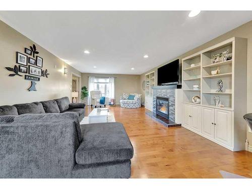 1620 53A Avenue Close, Lloydminster, AB - Indoor Photo Showing Living Room With Fireplace