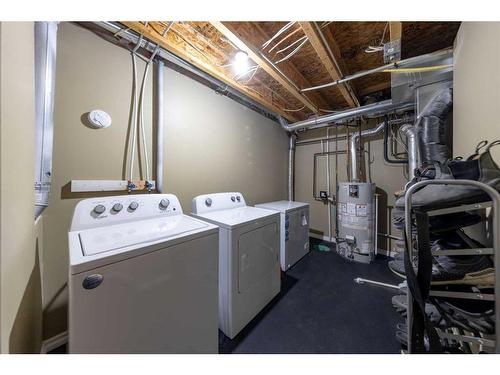 5304 51 Street, Blackfoot, AB - Indoor Photo Showing Laundry Room