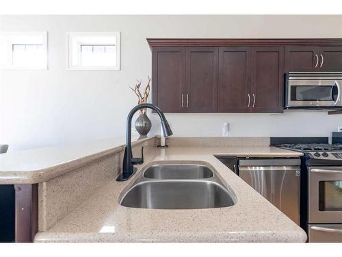 5304 51 Street, Blackfoot, AB - Indoor Photo Showing Kitchen With Double Sink