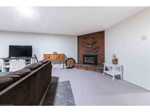 3912 53 Avenue, Lloydminster, AB - Indoor With Fireplace