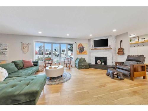 3912 53 Avenue, Lloydminster, AB - Indoor Photo Showing Living Room With Fireplace