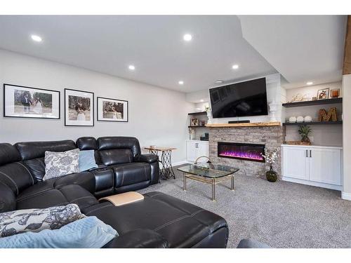 1815 61 Avenue, Lloydminster, AB - Indoor Photo Showing Living Room With Fireplace