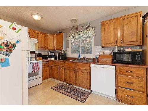 3106 57B Avenue, Lloydminster, AB - Indoor Photo Showing Kitchen With Double Sink