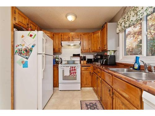 3106 57B Avenue, Lloydminster, AB - Indoor Photo Showing Kitchen With Double Sink