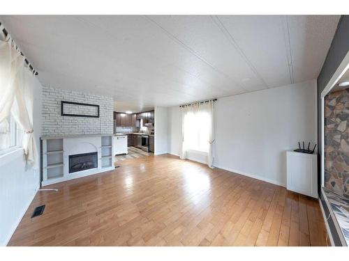 Se 5-52-2-W4 24006 Twp Rd 520, Rural Vermilion River, County Of, AB - Indoor Photo Showing Living Room With Fireplace