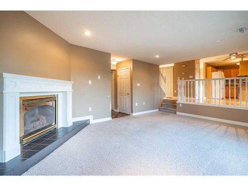 5708 39 Street, Lloydminster, AB - Indoor Photo Showing Living Room With Fireplace