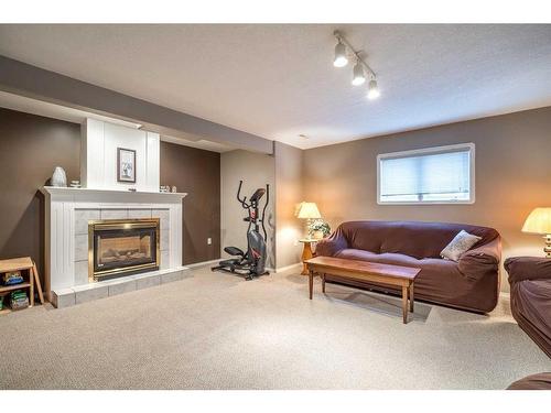 2308 54 Avenue, Lloydminster, AB - Indoor Photo Showing Living Room With Fireplace