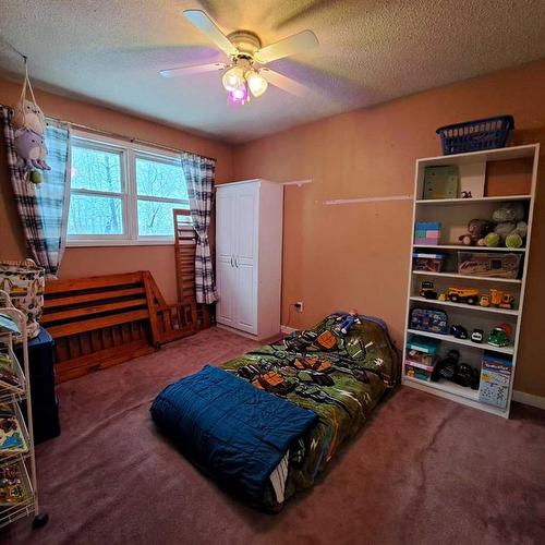 13045 Hwy 16E & King Street, Rural Vermilion River, County Of, AB - Indoor Photo Showing Bedroom