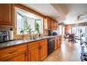 1942 8 Avenue, Wainwright, AB  - Indoor Photo Showing Kitchen With Double Sink 