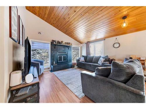 5702 31 Street, Lloydminster, AB - Indoor Photo Showing Living Room With Fireplace